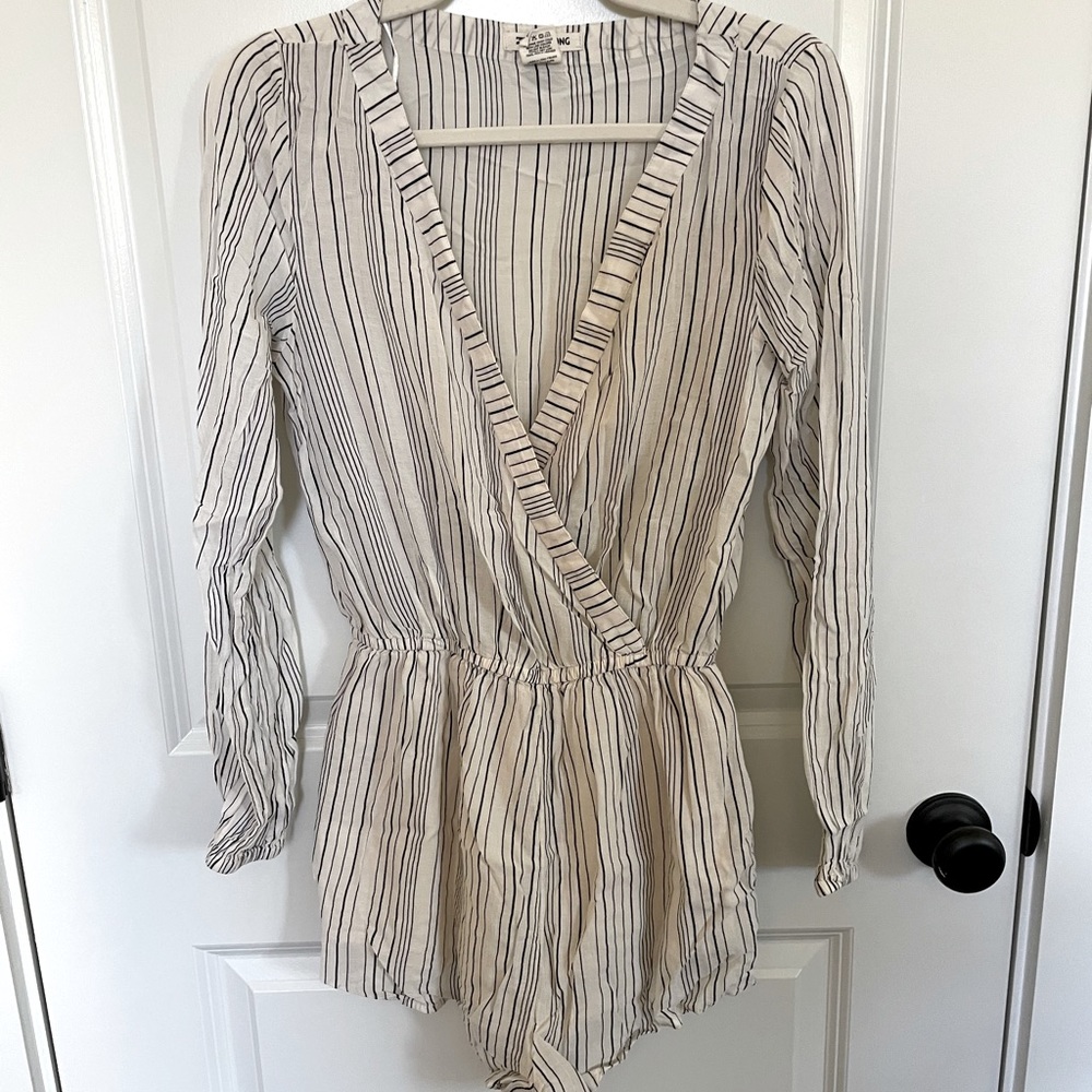 Billabong romper with long sleeves